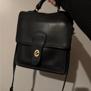 vintage Coach Station bag in black leather.
